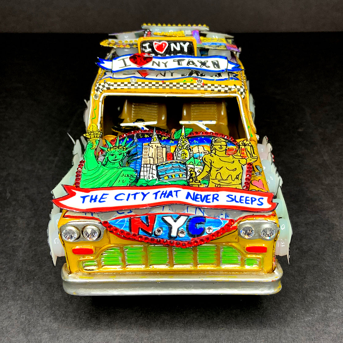 Taxi on Broadway by Day