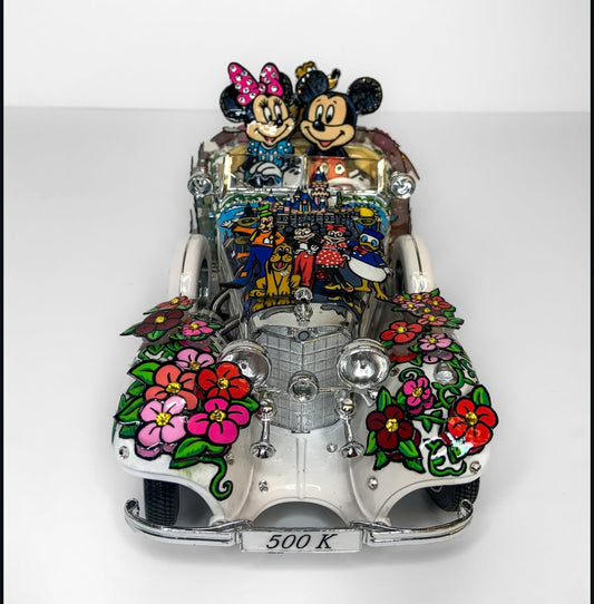 Mickey and Minnie Driving a Mercedes